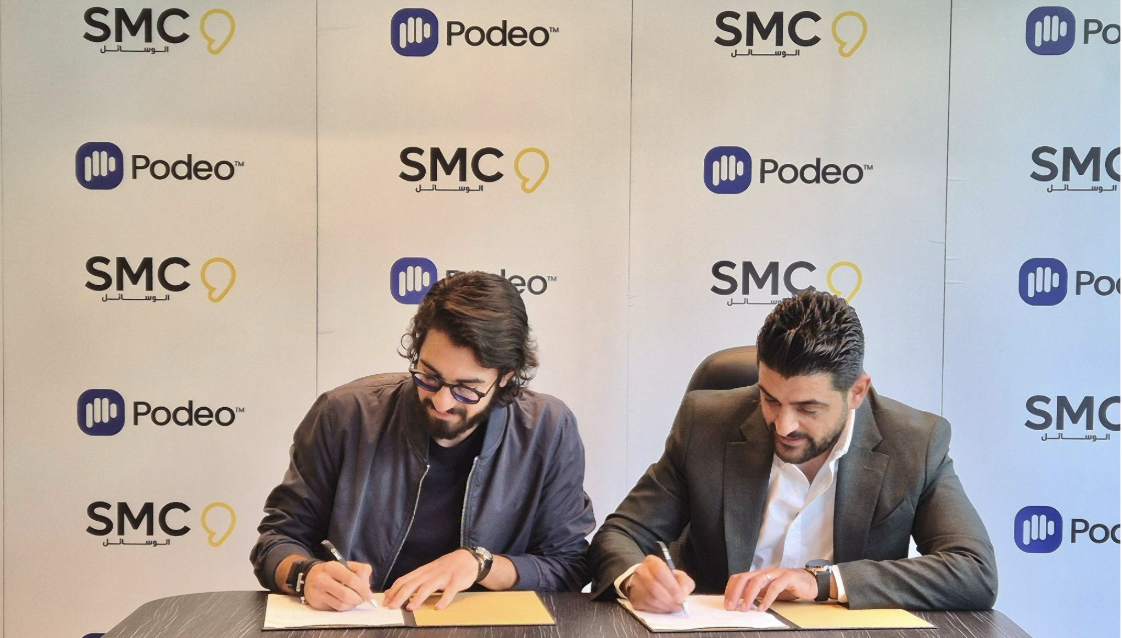Podeo & SMC Partnership Stefano Fallaha, CEO & Founder of Podeo, Michel Bayeh, Media Executive Director at SMC Group signing the partnership agreement